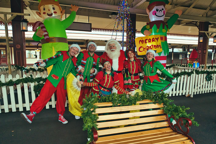 Santa with elves on platform 3 Aviemore station