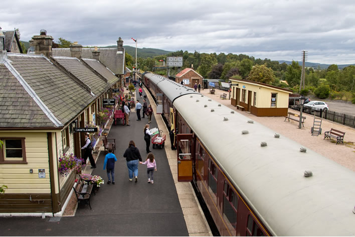 Passengers walking along the platform at Boat of Garten station